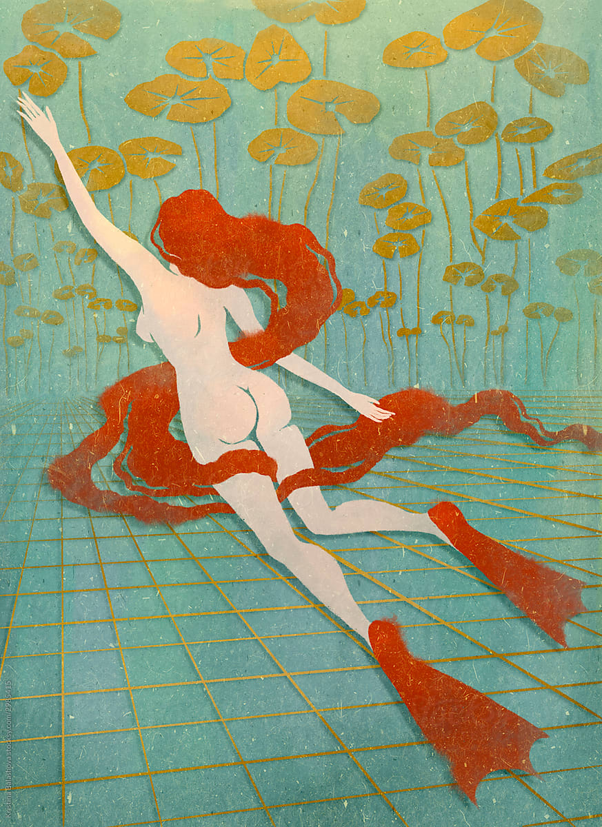 The red-haired naked girl in flippers swims