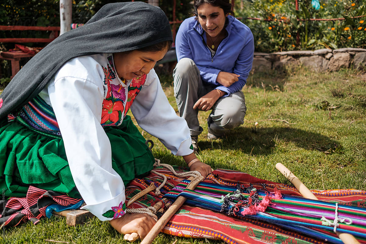 tourist learning traditional peruvian culture