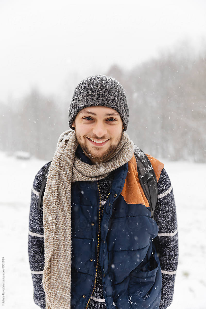 Smiling guy under the snow
