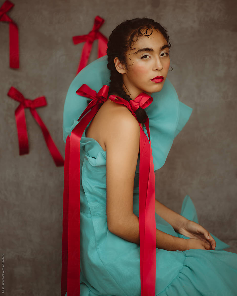 Elegant Teen Girl with Red Bows