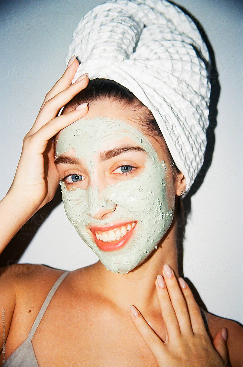 Woman portrait Exuberant Clay Mask Beauty Routine with flash