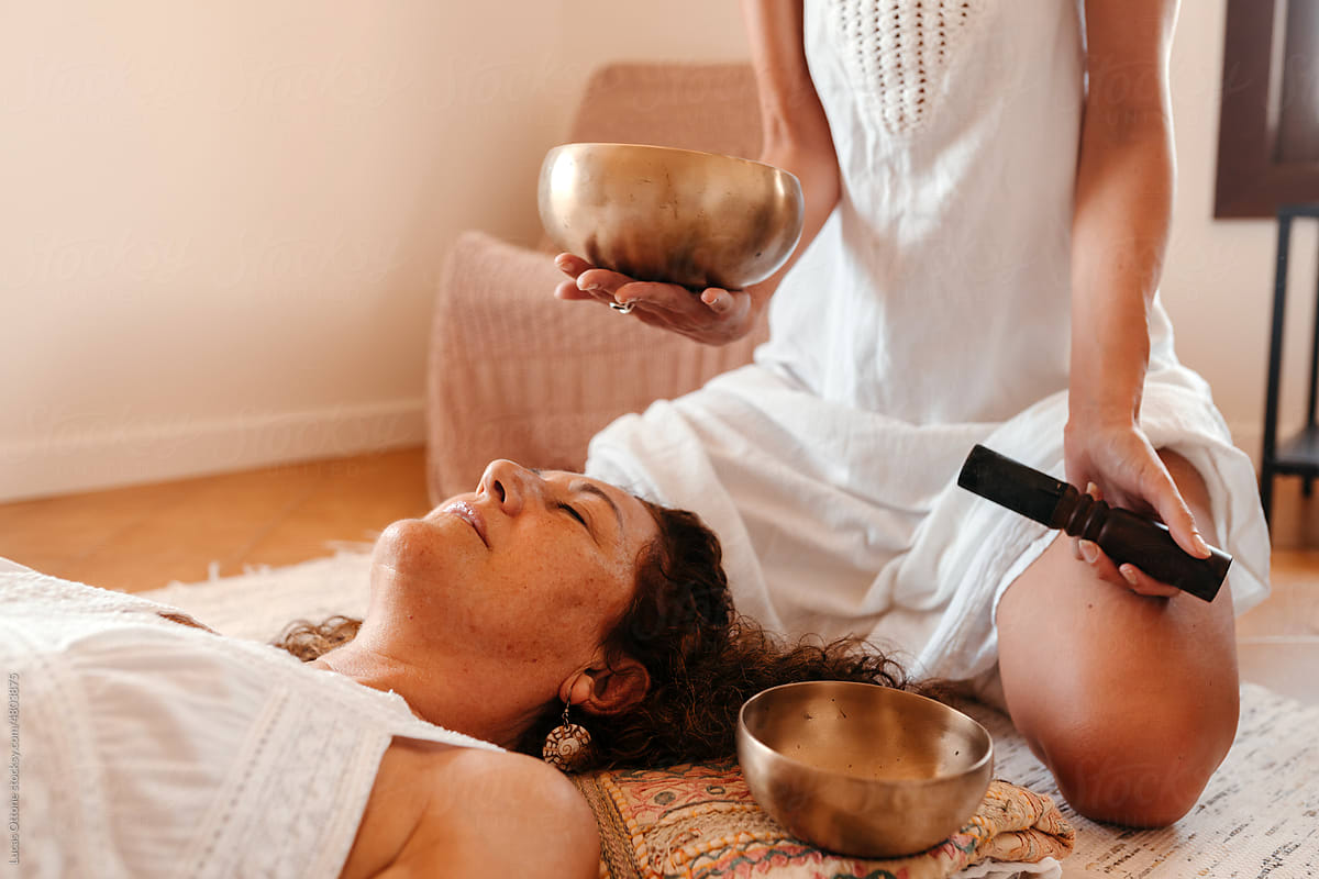 Mature woman experiencing a sound healing therapy