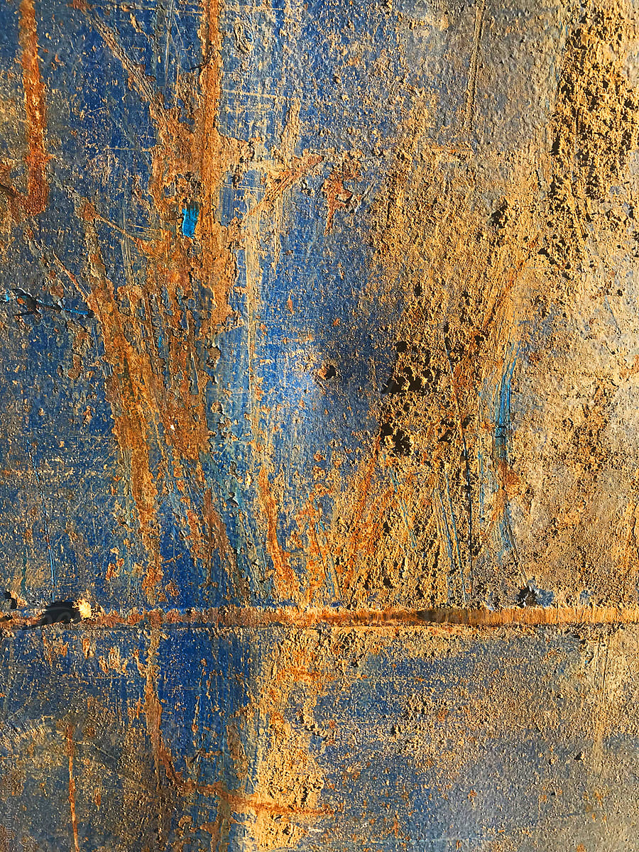 Close up of peeling paint and rust on metal container