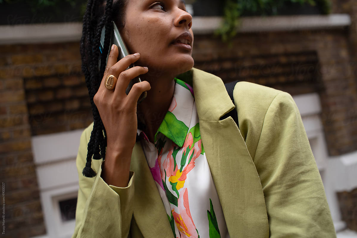 BIPOC candid woman on phone call