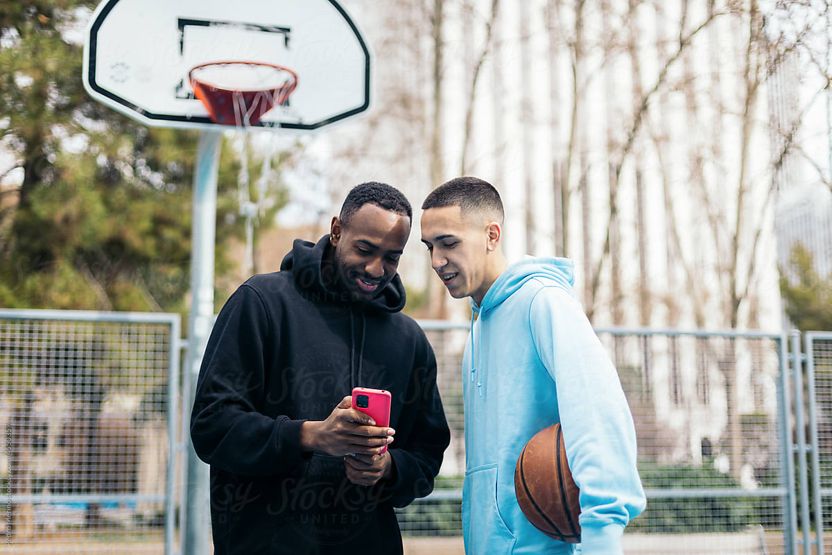 Friends on a basketball court