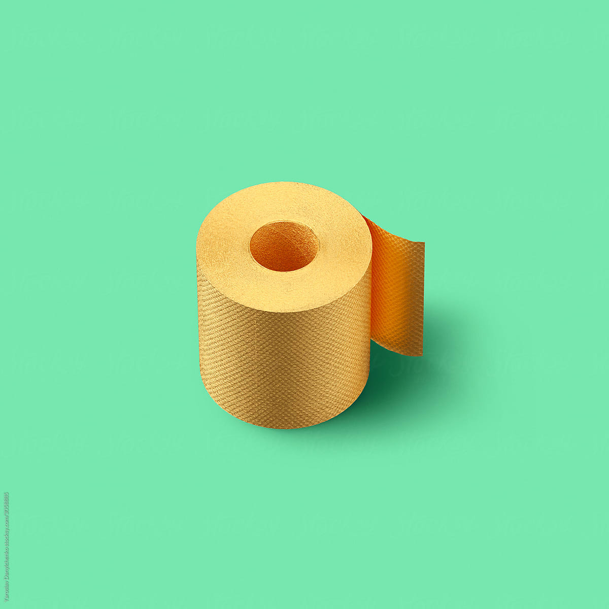 Creative backdrop from golden painted toilet roll paper on a cyan color background