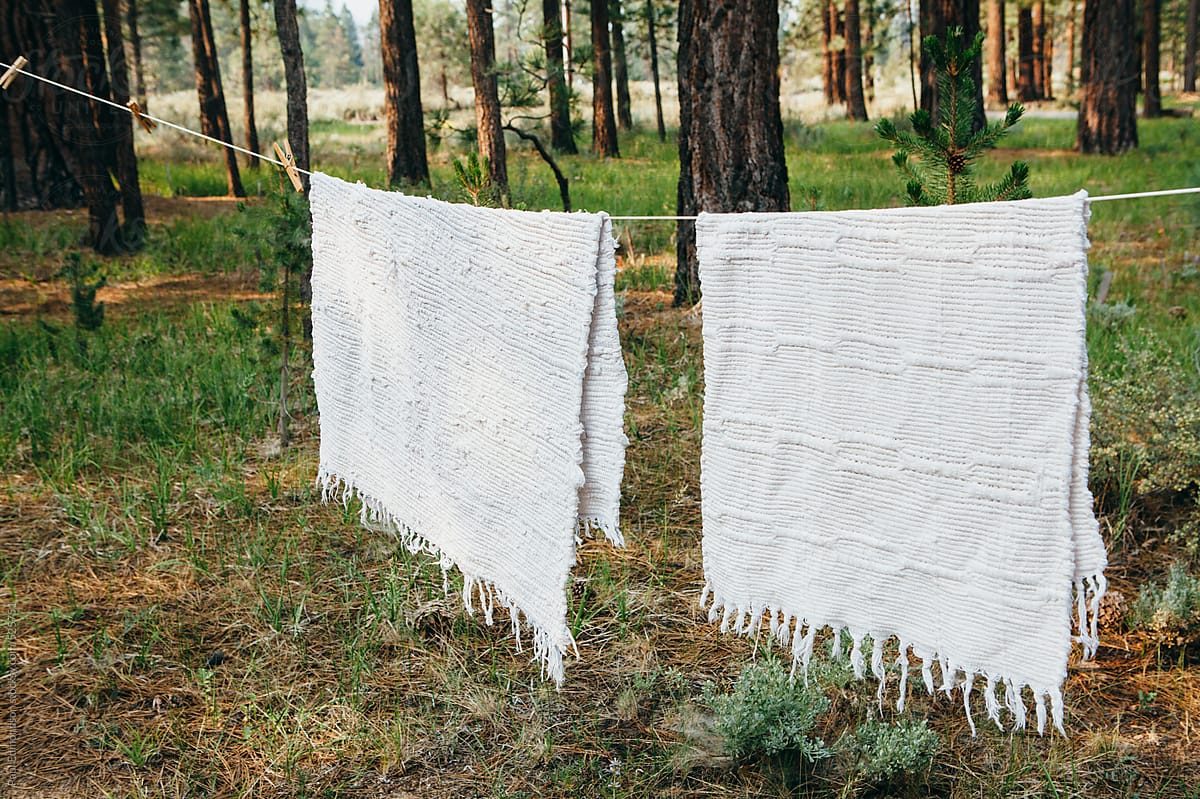 Laundry hanging to dry outside mountain cabin