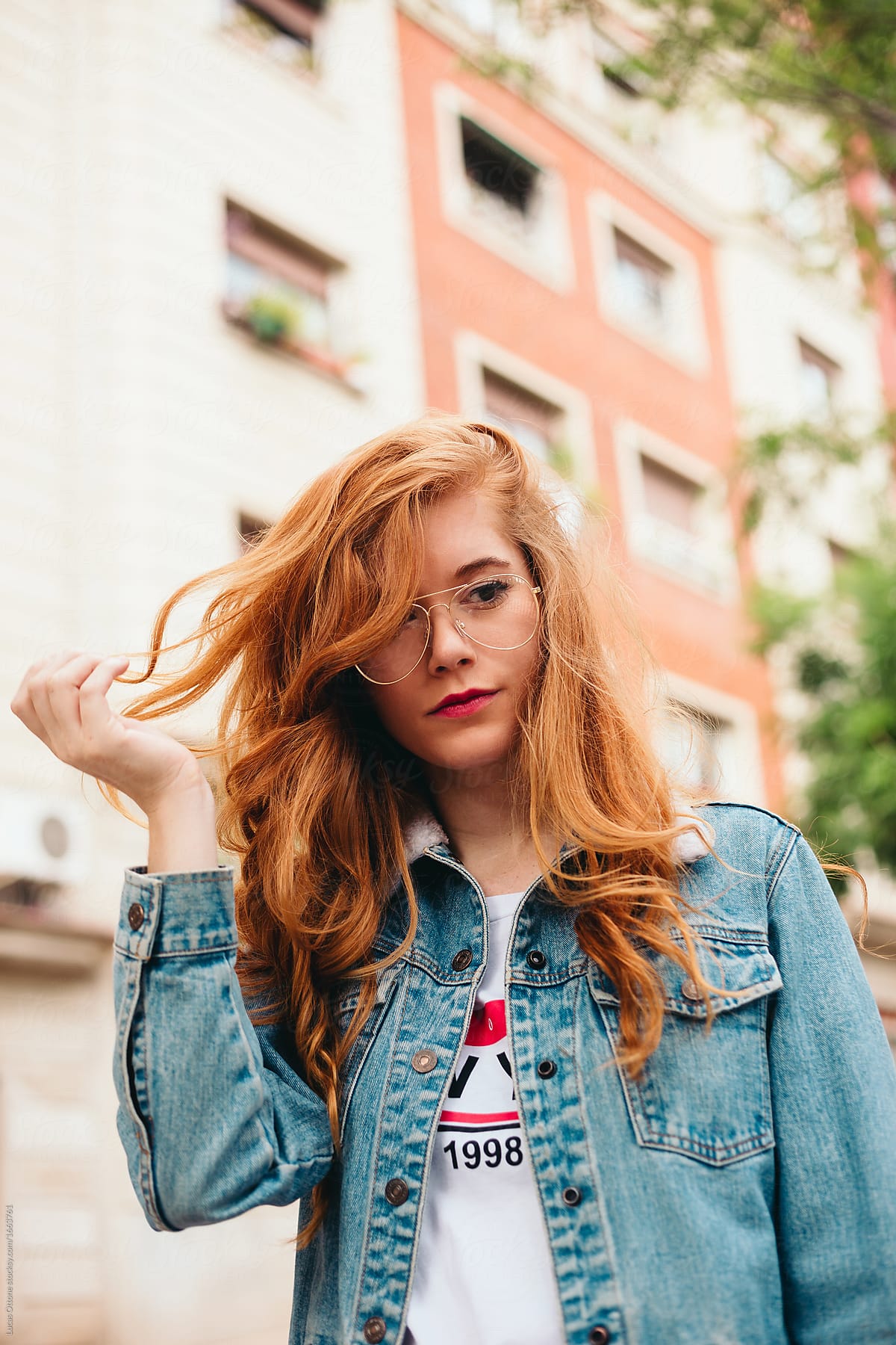 Attractive redhead woman with vintage glasses by Lucas Ottone - Redhead