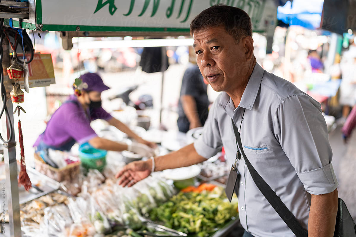 Thai man in a street market.