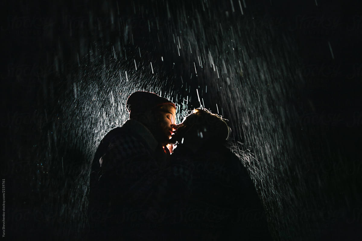 Couple Kissing Under The Rain By Yura Shevchenko Stocksy United
