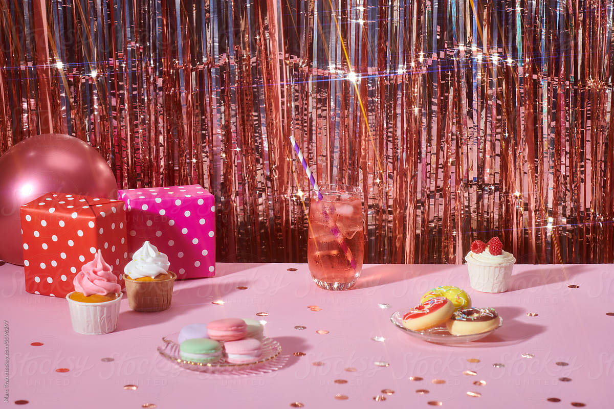 Composition with delicious cupcake on the glitter background.