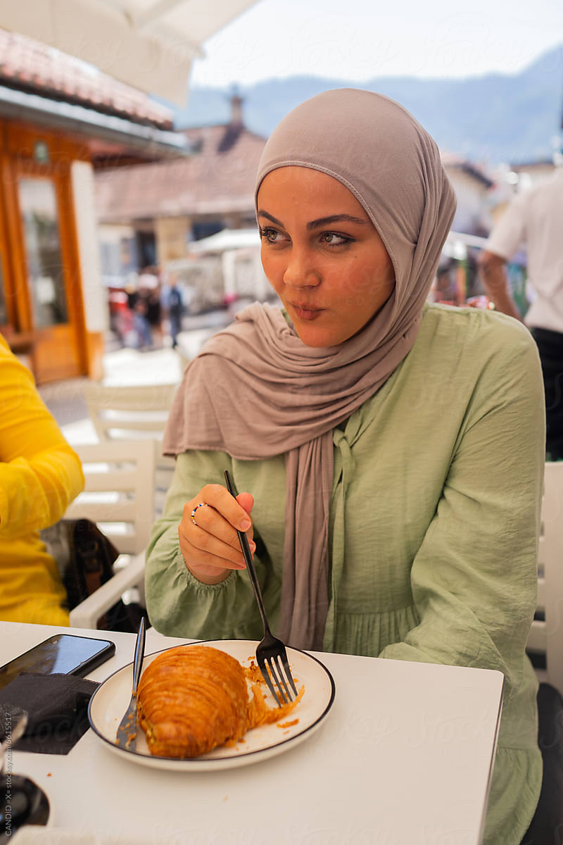 Muslim Woman Eating with her Friends