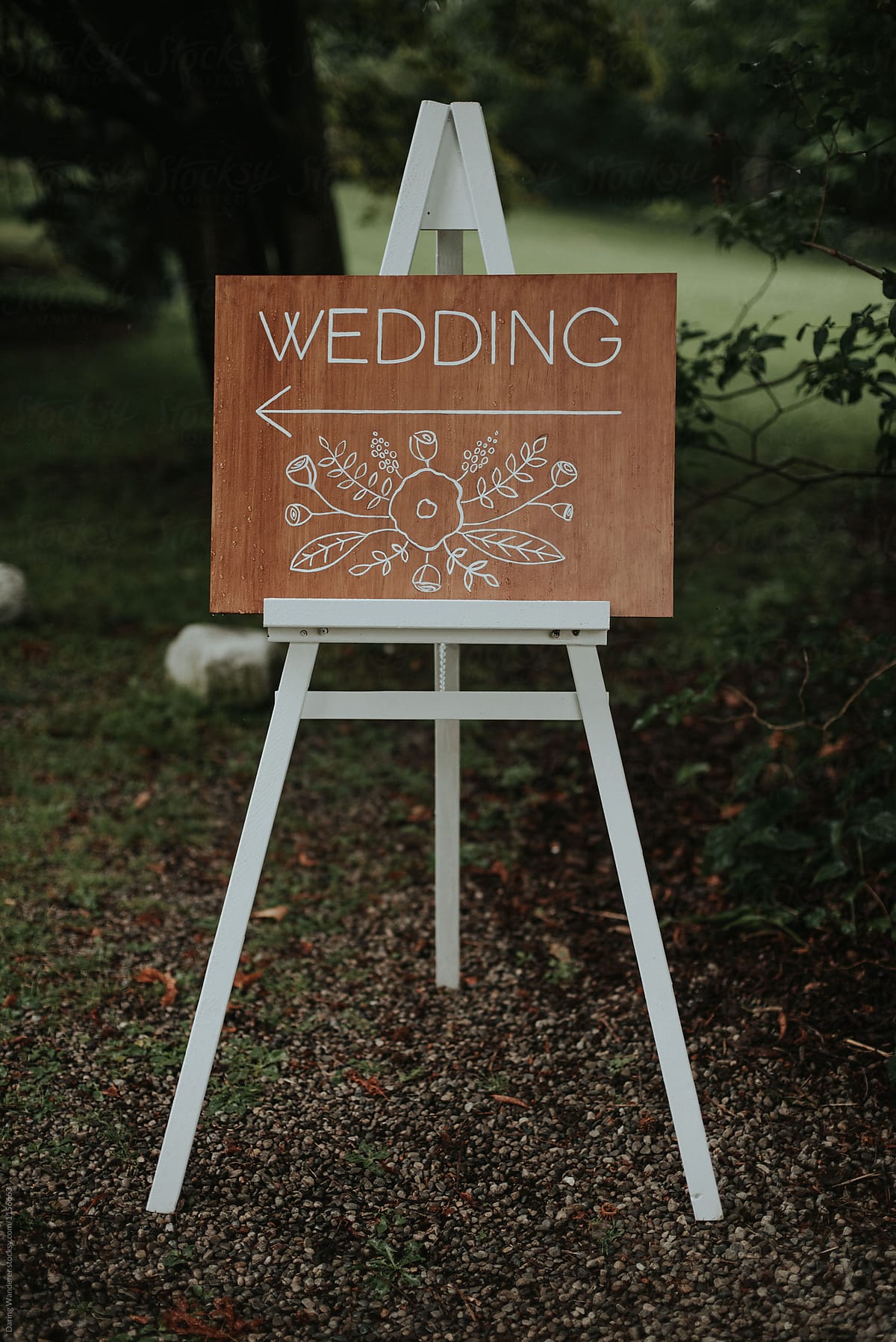 Handmade diy wedding sign with white paint on wood for outdoor wedding
