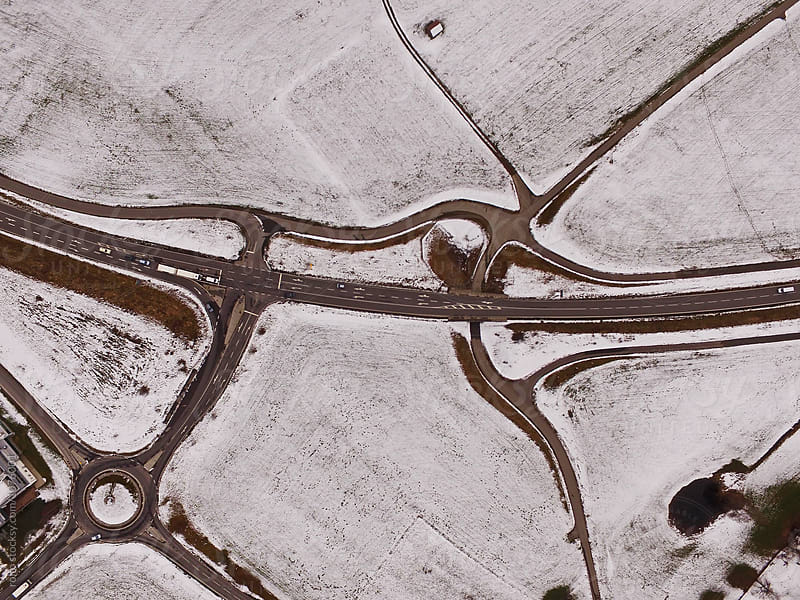 Highway in snowy fields