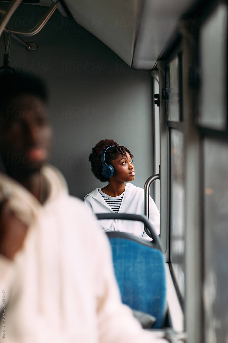 Teenager riding bus