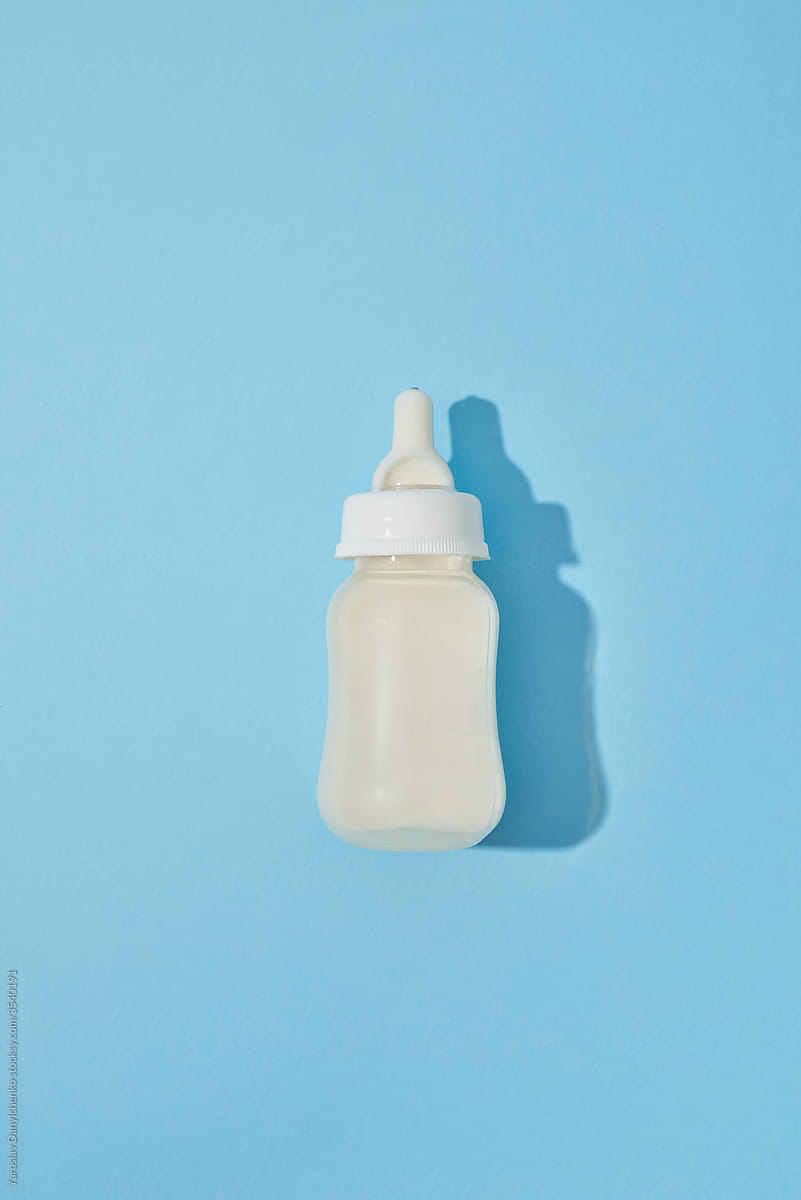 Baby bottle with breast milk for feeding.