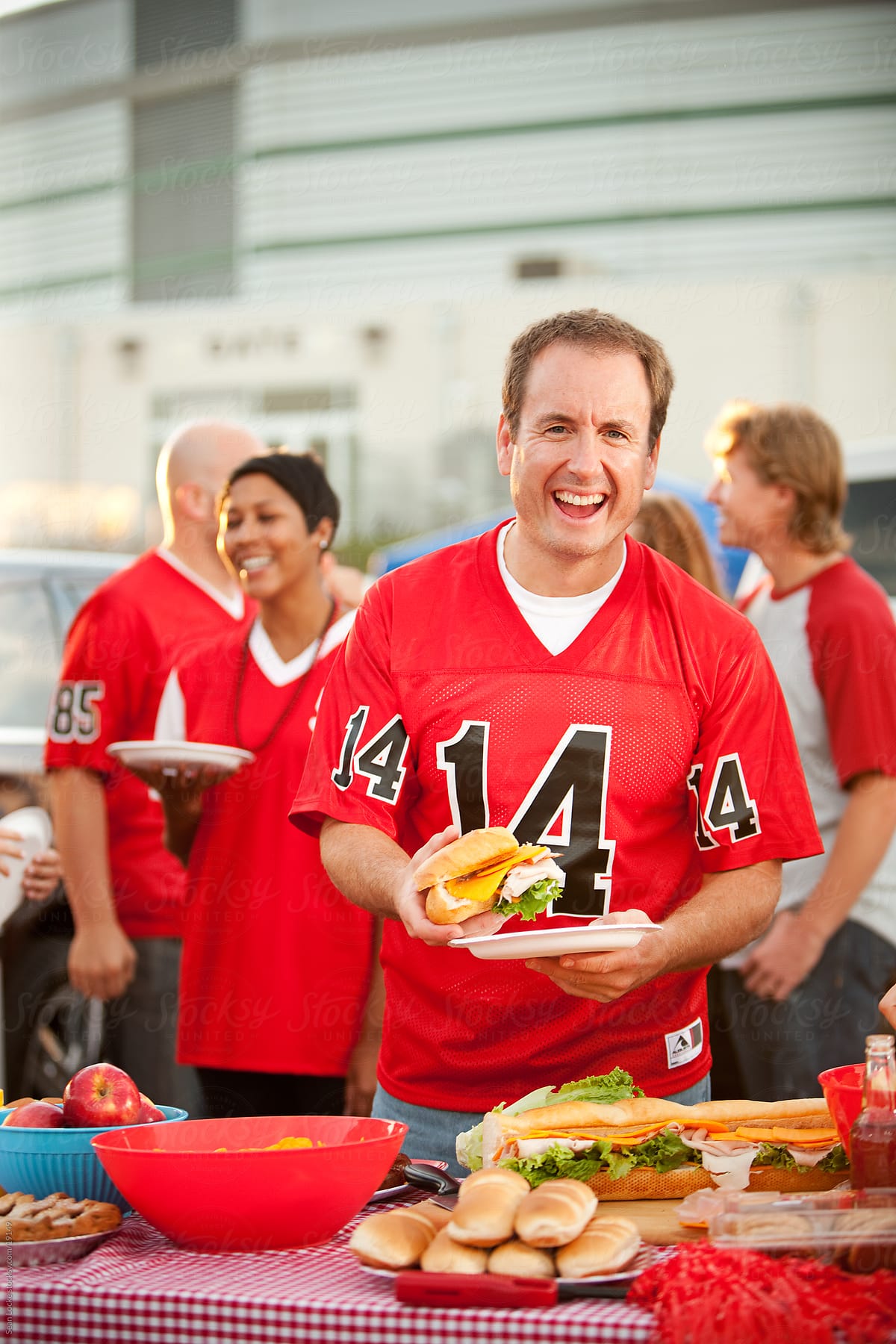 Tailgating: Man Having Great Time at Tailgate Party