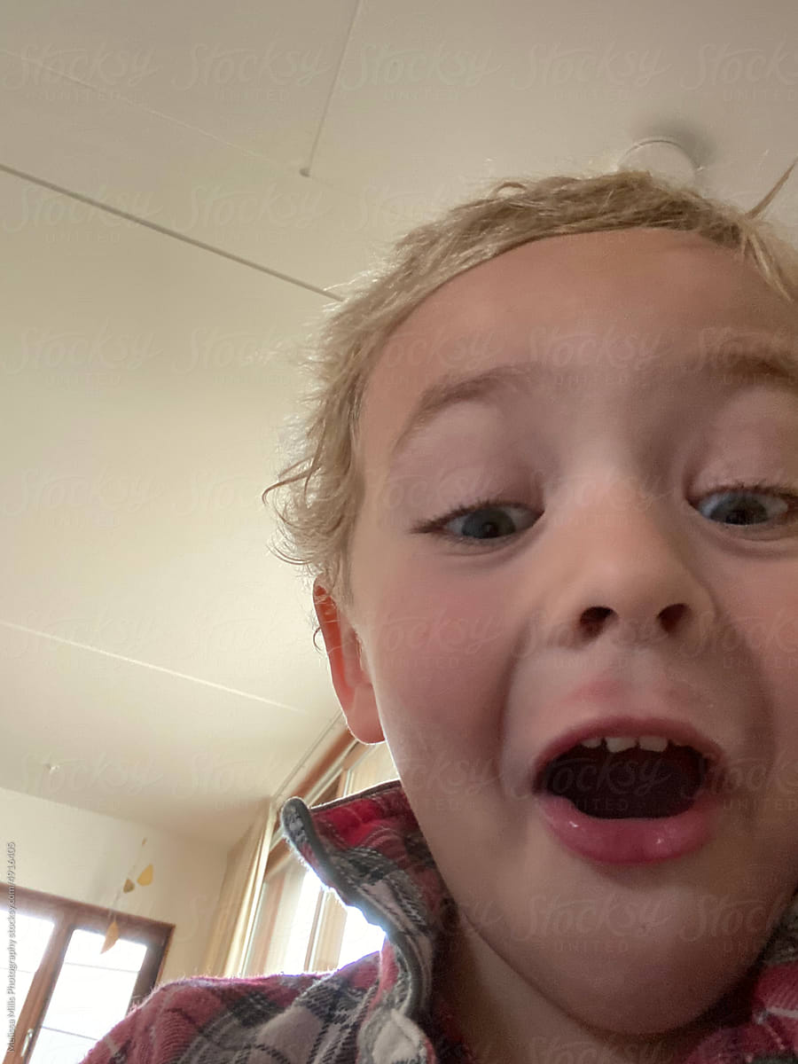 Boy discover selfie mode on phone