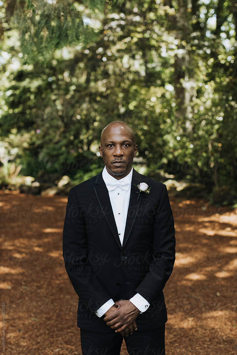 Portrait of Handsome Groom Looking at the Camera