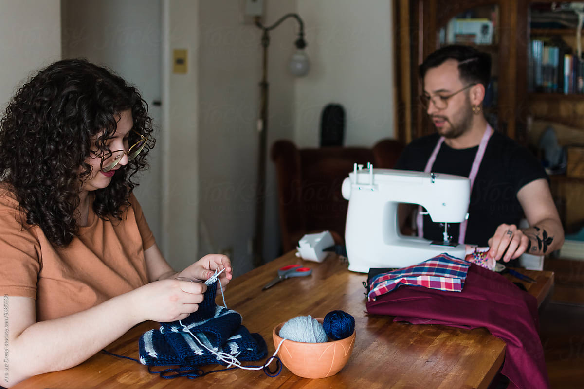 Couple creating clothing at home