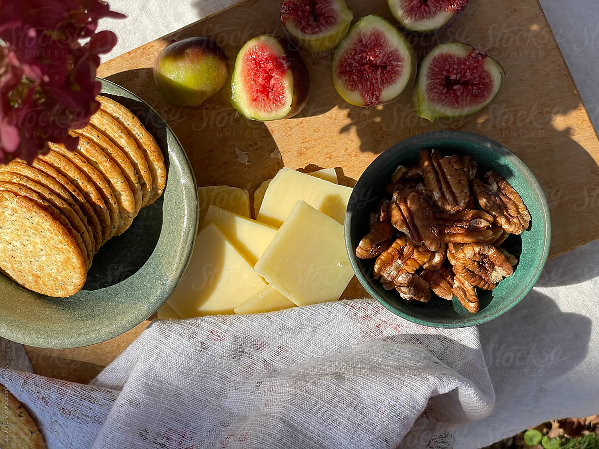 UGC of beautiful Fall table with crackers and cheese and figs.