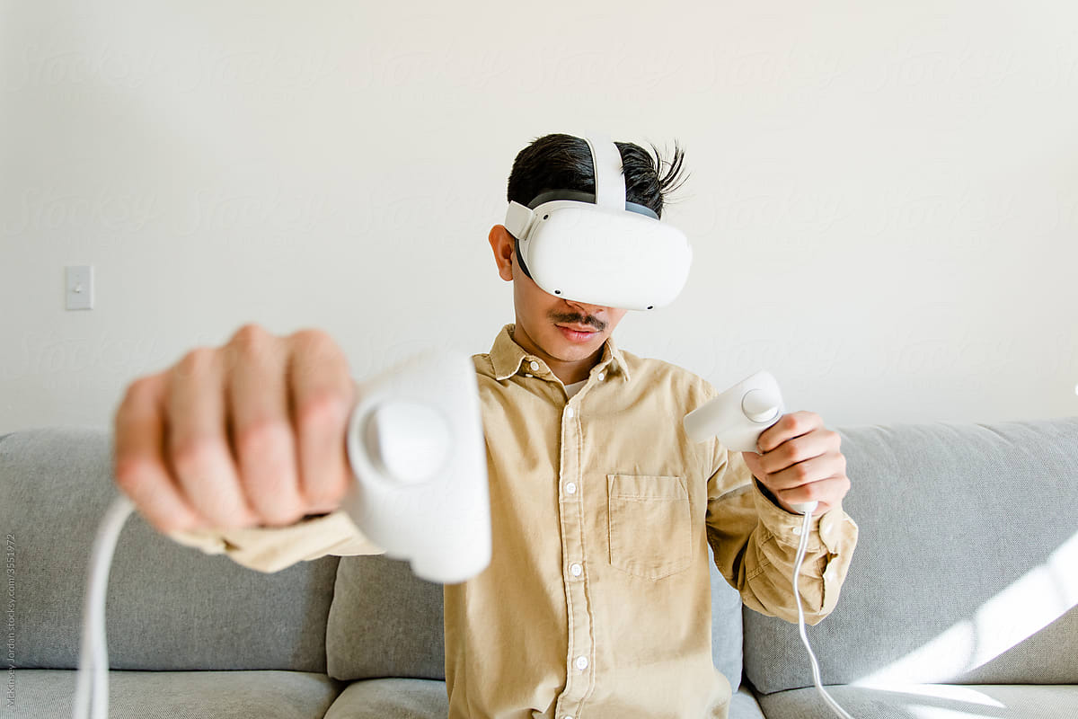 Man Plays a Virtual Reality Boxing Game