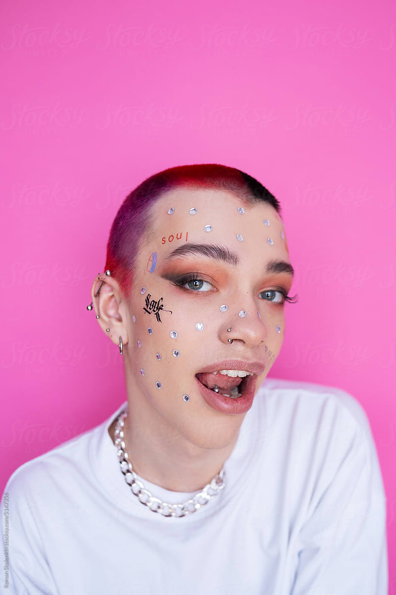 Young Non Binary Gay With Makeup In Studio