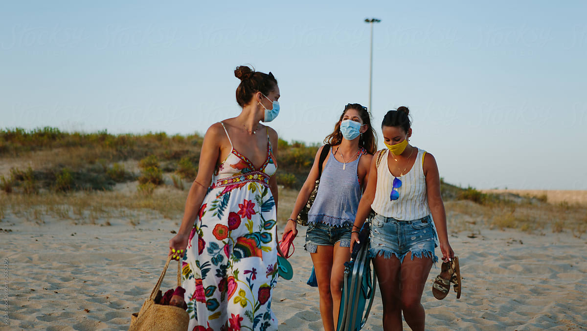 Wth masks on at the beach