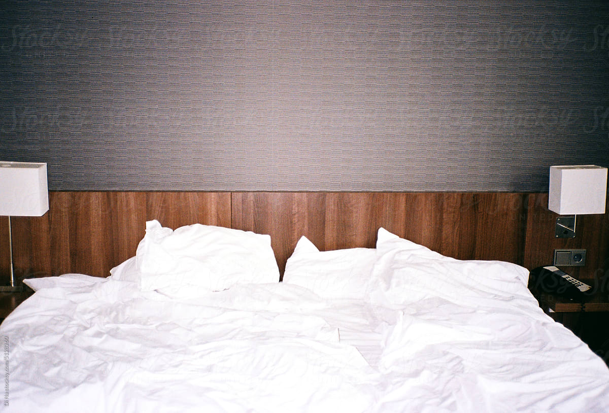 Empty hotel bed shot on film