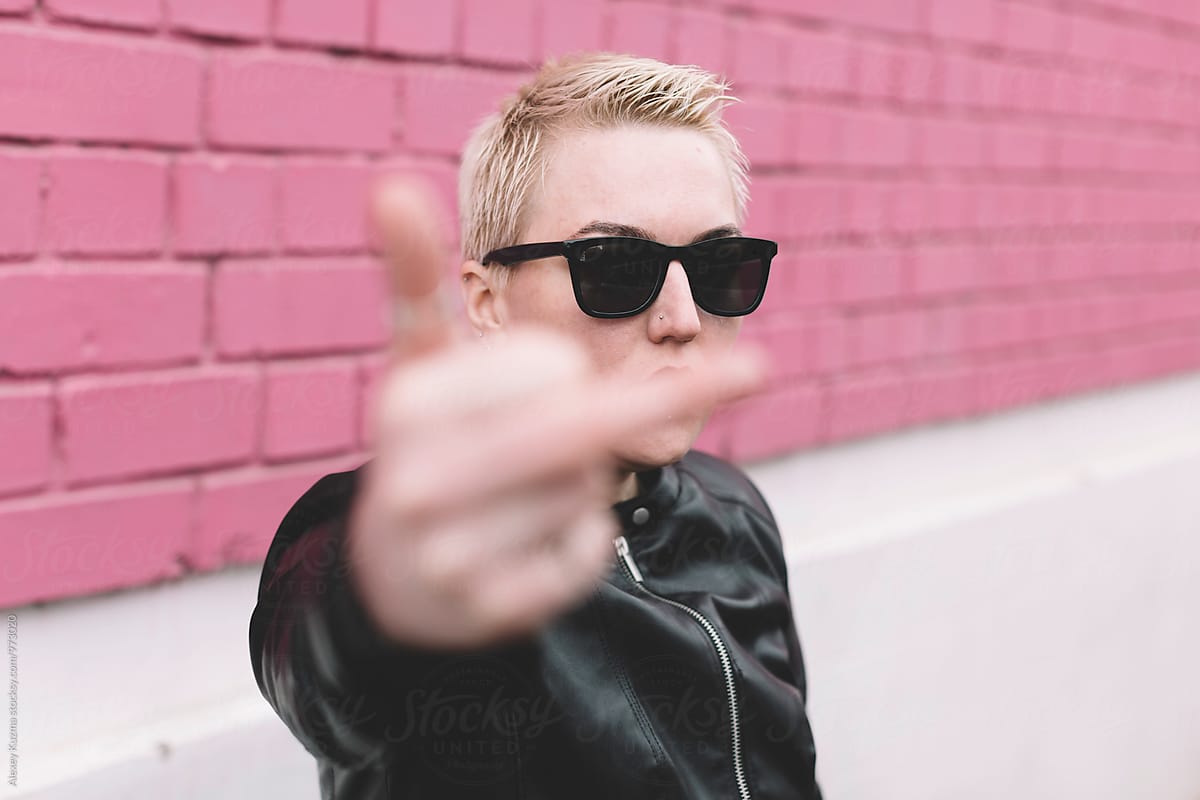 cool woman showing middle finger