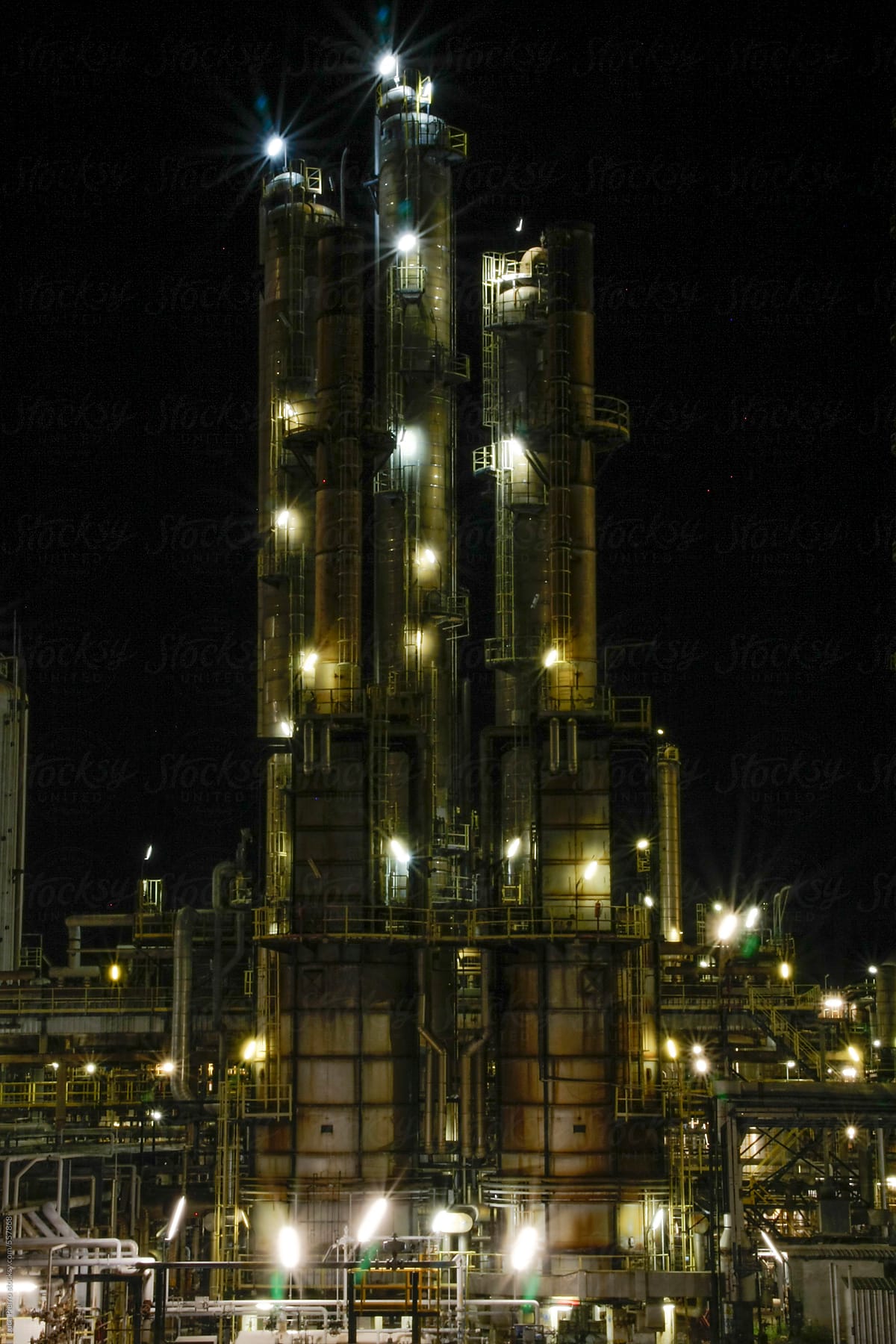 Oil refinery site at night