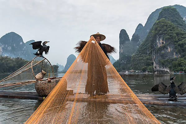 Chinese Traditional Fisherman by Stocksy Contributor Bisual Studio -  Stocksy