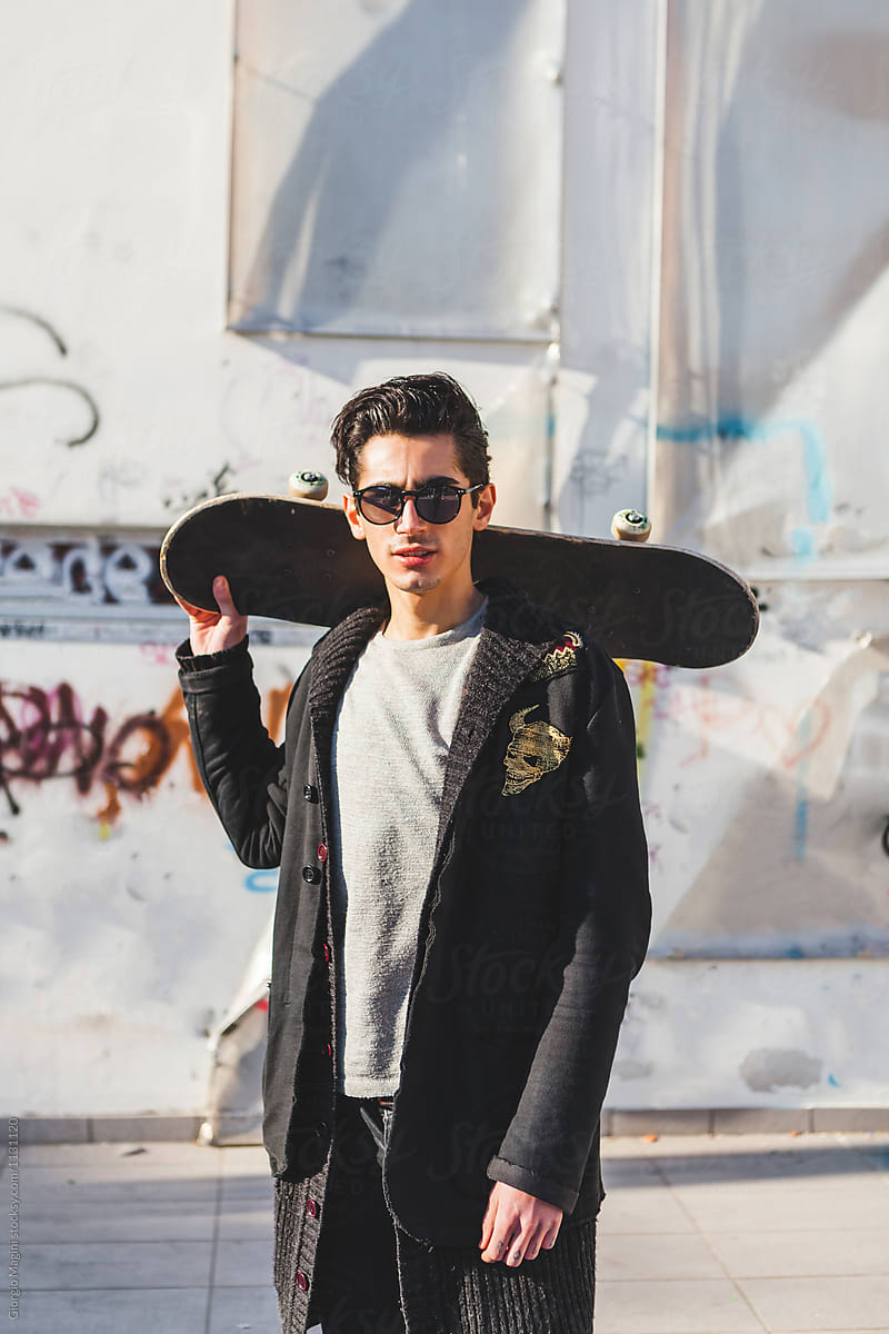 Portrait of a Young Skateboarder in Urban Area