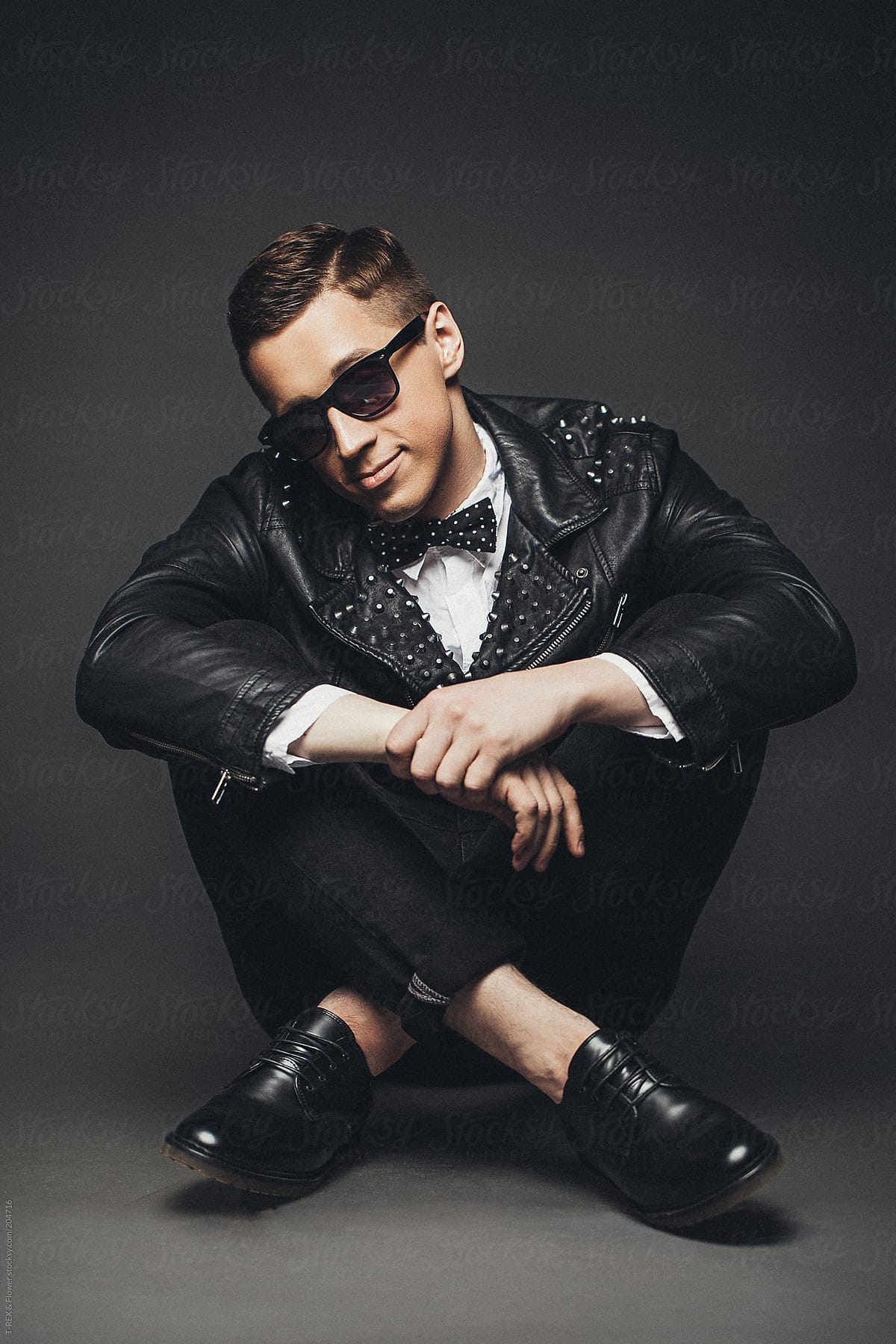 Stylish young man in sunglasses