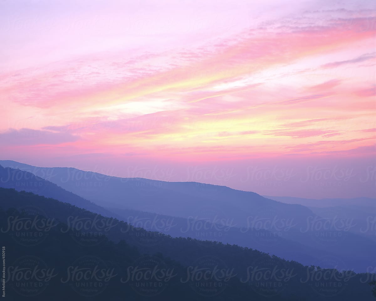 predawn time exposure of first morning light over Blue Ridge Mountains North Carolina