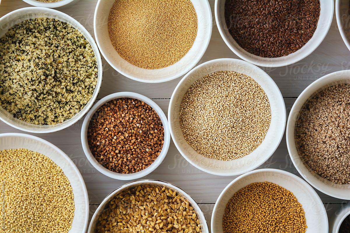 Various health seeds and grains arranged in bowls