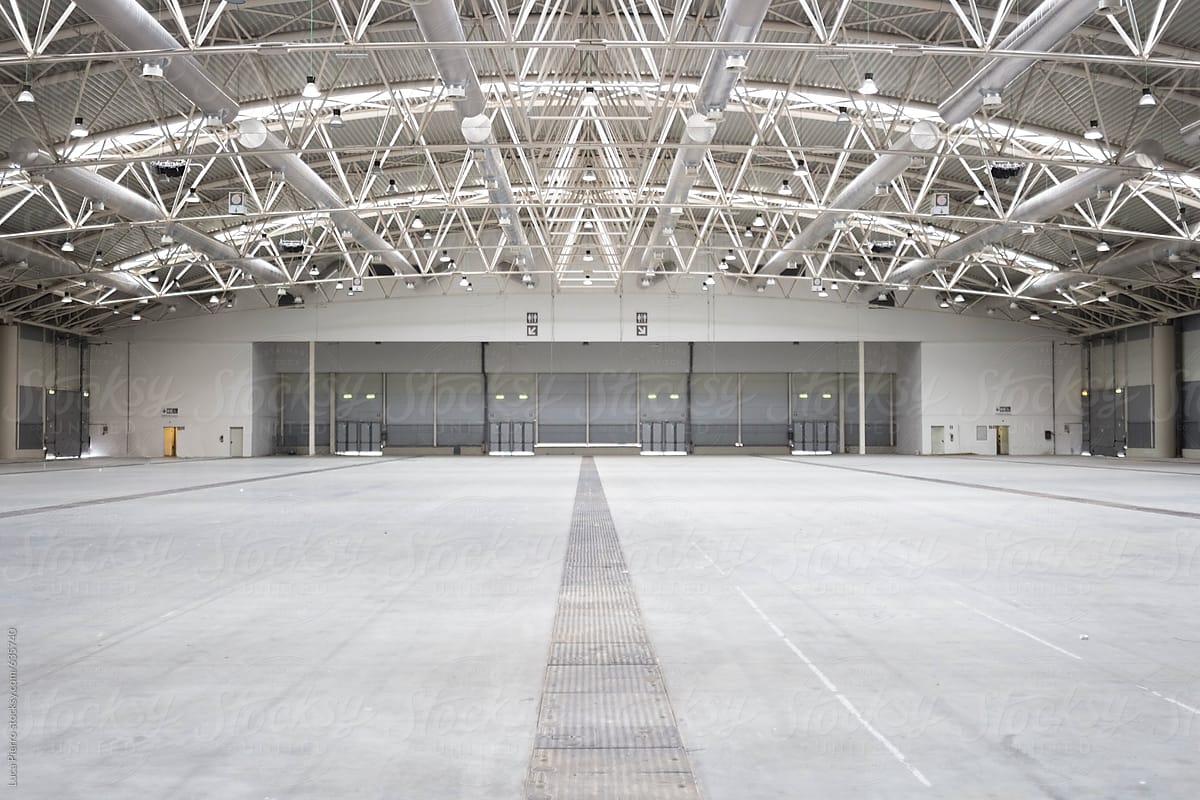 Empty white warehouse interior