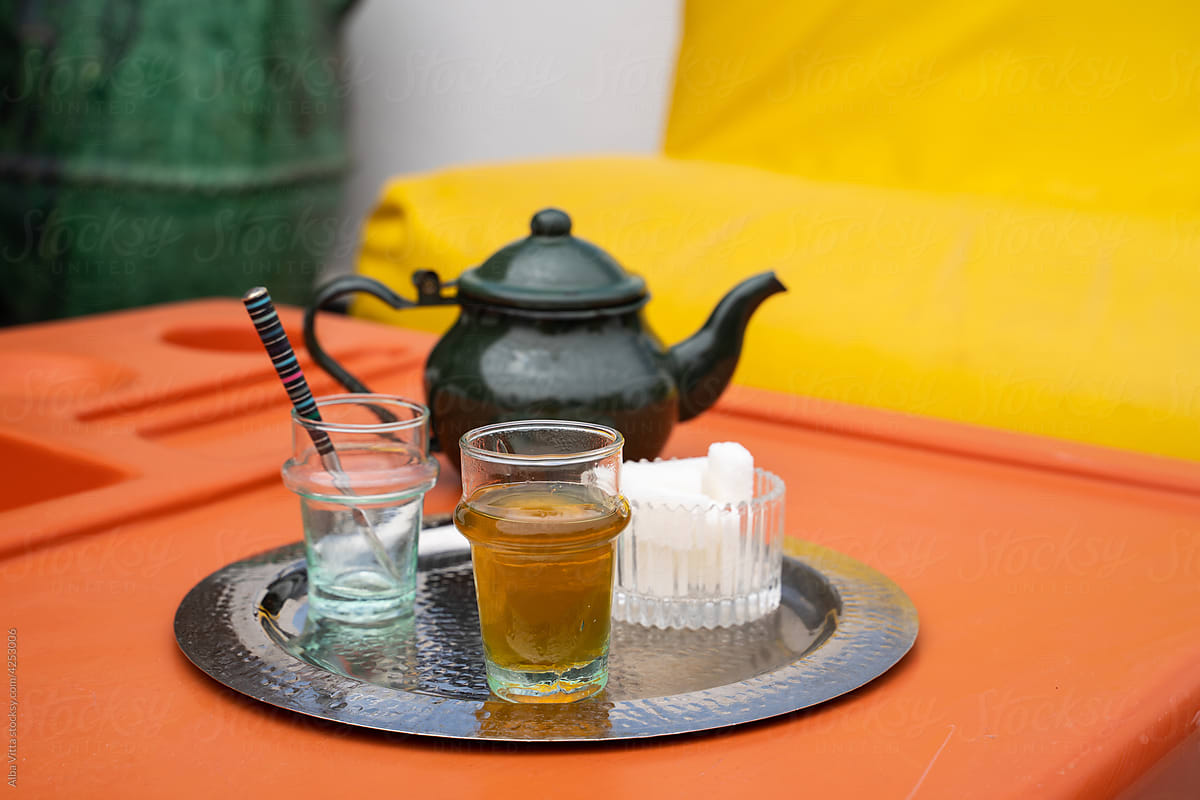 Moroccan Teapot and glasses arrangement on tea table