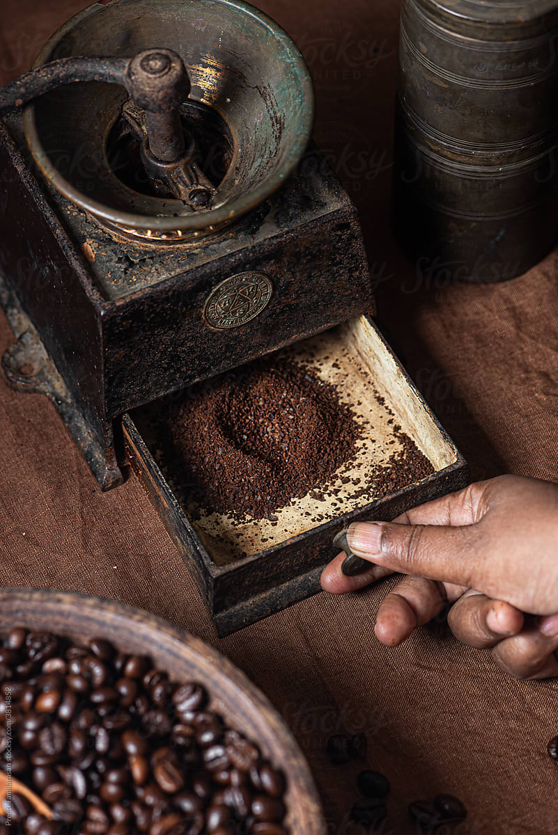 Still shot of coffee grinder and beans