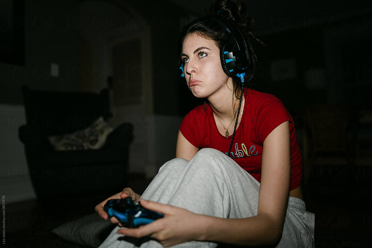 young woman playing video games