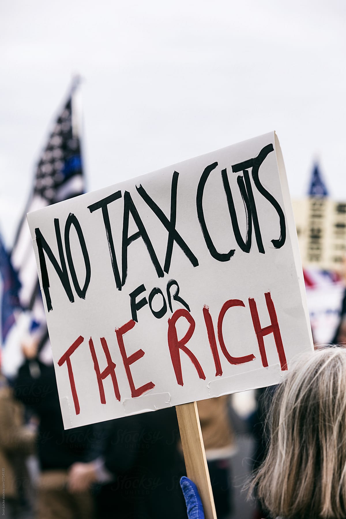 Protest: Sign That Tax Cuts For The Rich Are Unfair