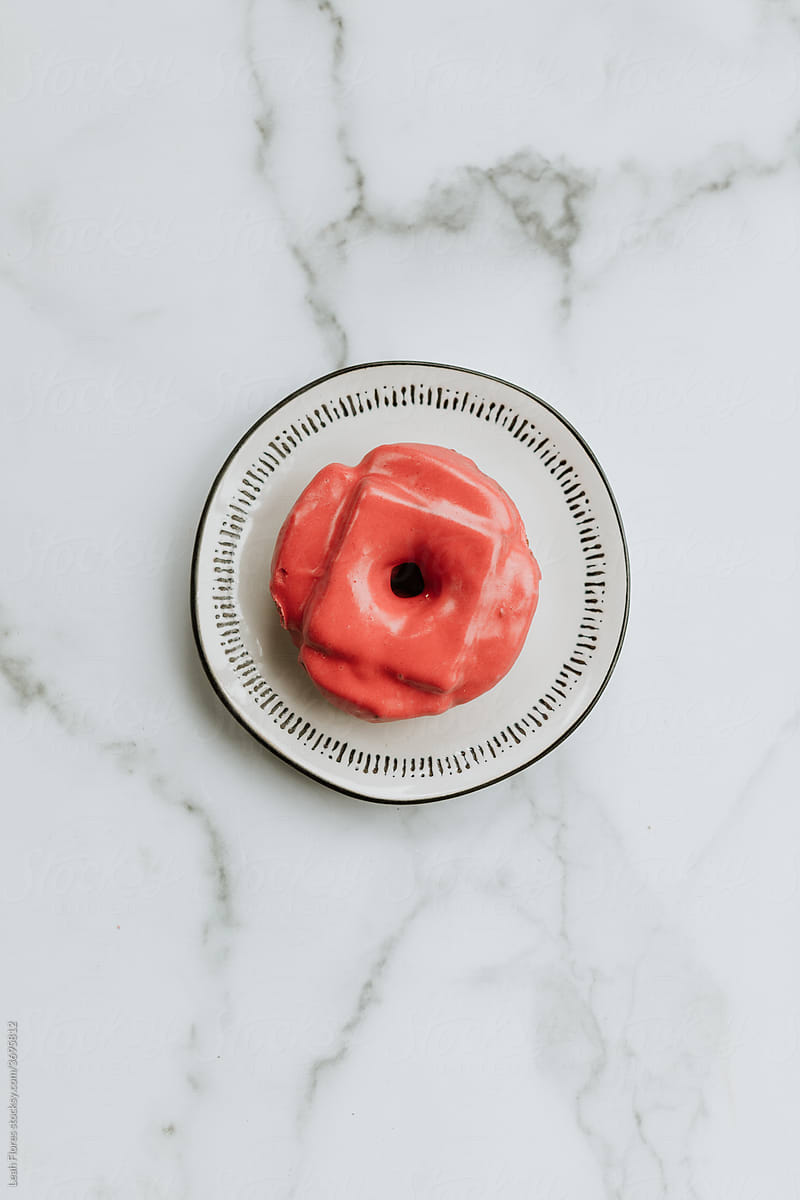 Bright Pink Donut on Plate