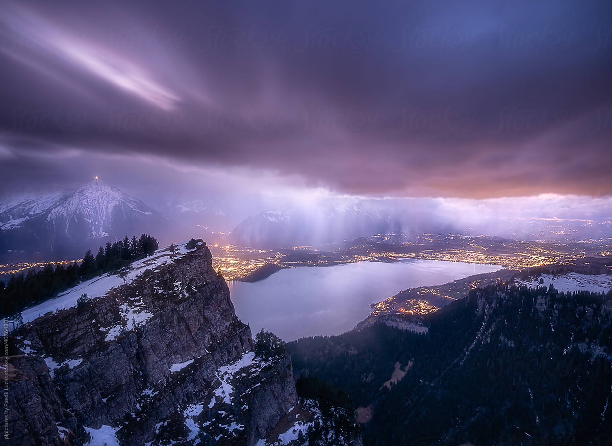 Storm clouds over alpine valley