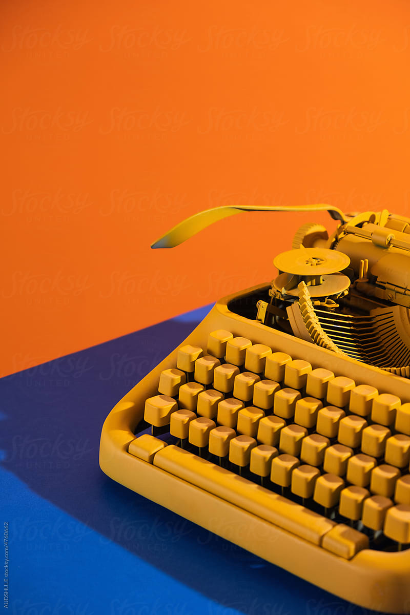 detail typing machine orange blue