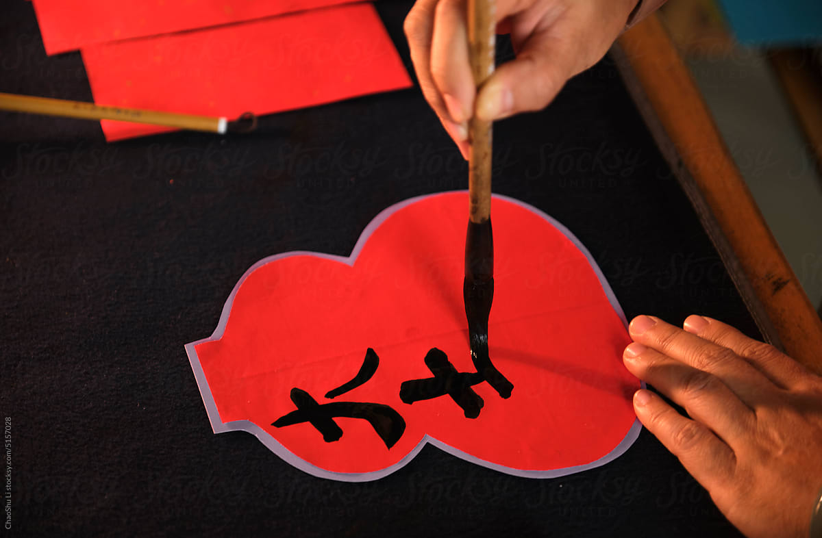 Make traditional Chinese New Year brush calligraphy decorations