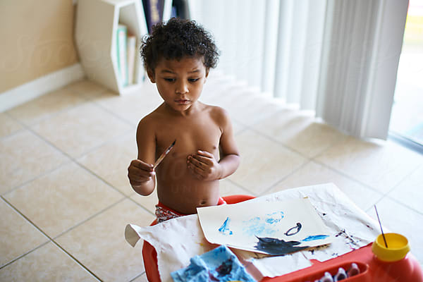 Mixed Race Toddler Painting by Stocksy Contributor Marlon Richardson -  Stocksy