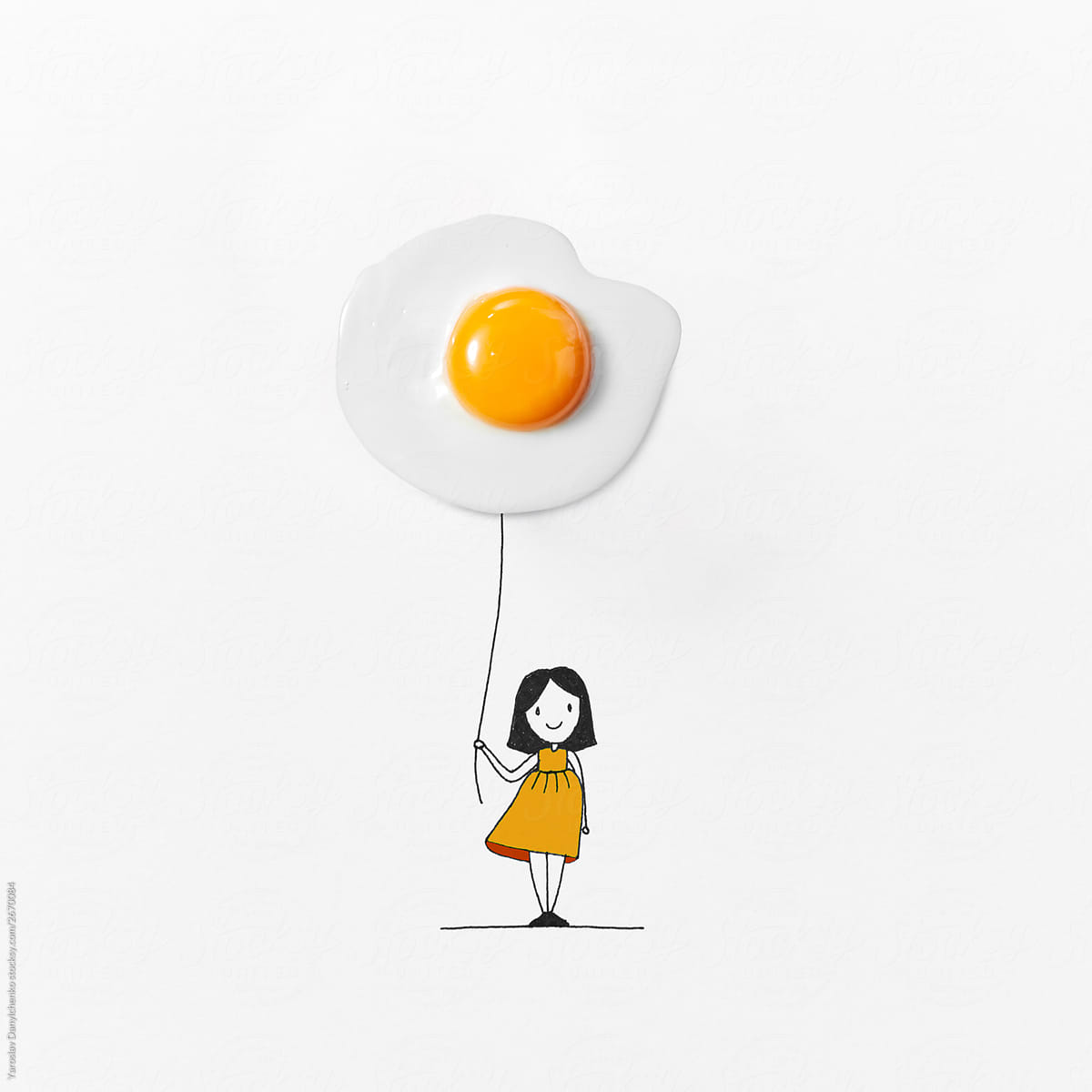 Image of girl with egg\'s balloon .