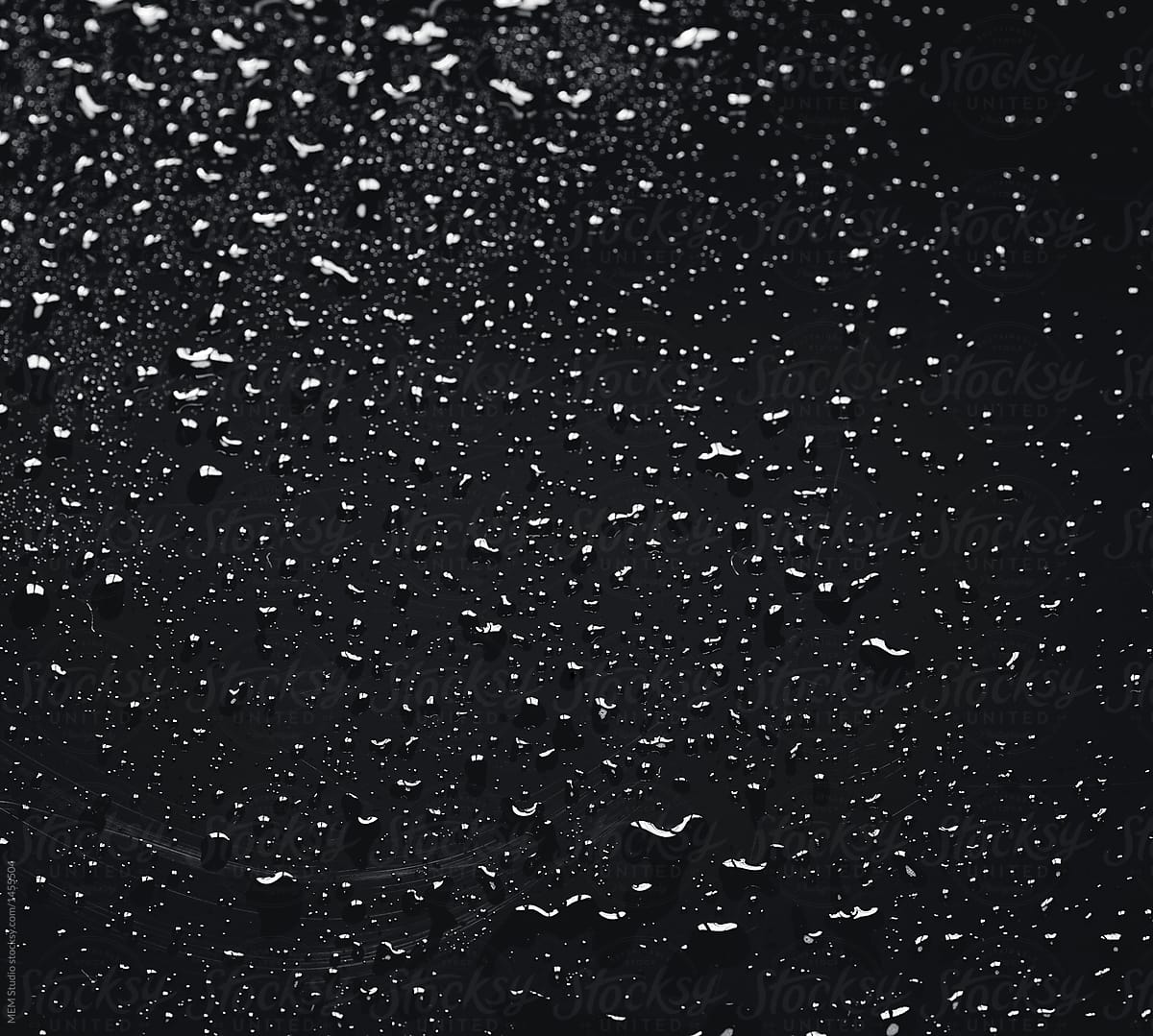 Water drops on a black gloss surface
