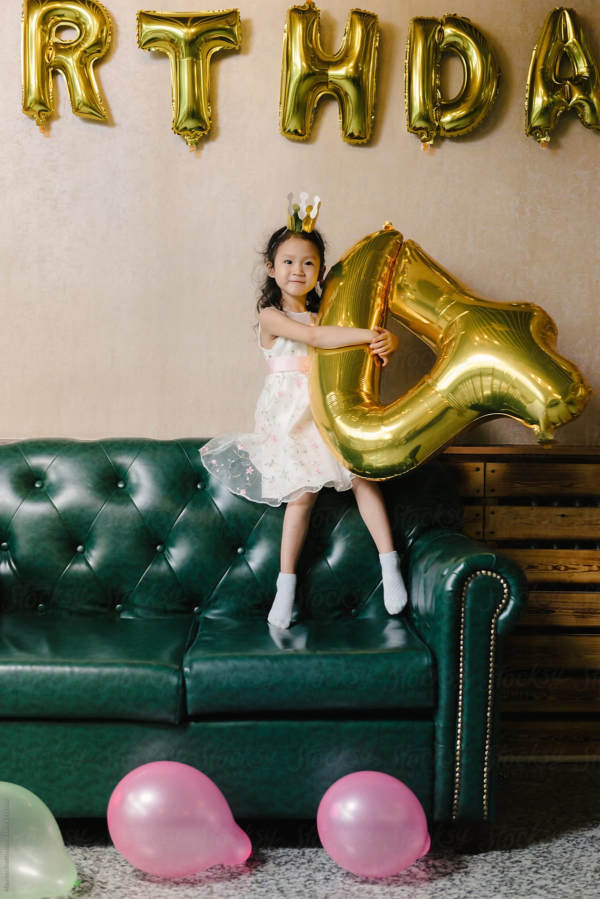 Adorable Girl At Her Birthday Party By Stocksy Contributor Maahoo Stocksy