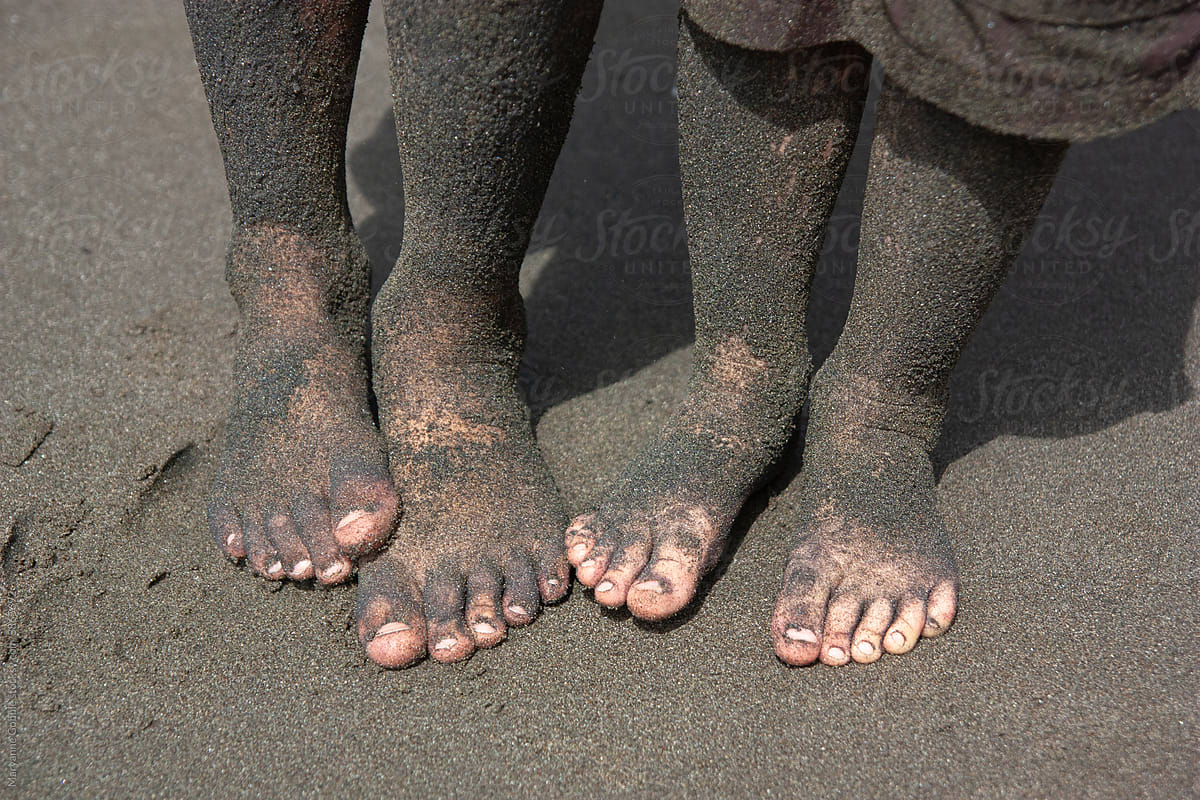 Two Boys with Sandy Feet at the Beach